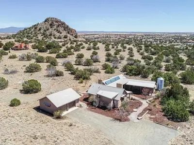 Aerial View of House and Bunkhouse with Lone Butte